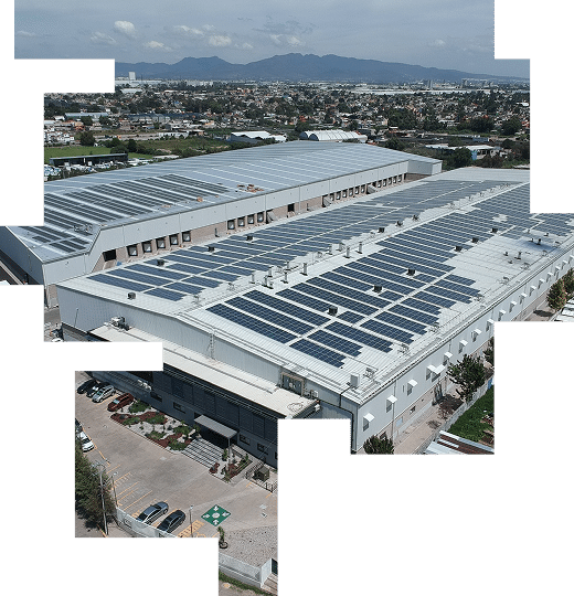Vista aérea de paneles solares sobre una nave industrial con andenes de carga